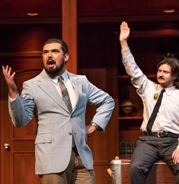 Two USD actors performing on stage.