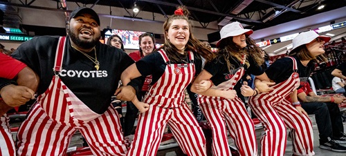 The Coyote Crazies doing the Yote "sway" before a basketball game.