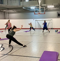A group fitness class at the wellness center in progress.