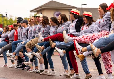USD Students kicking in a line at Dakota Days.