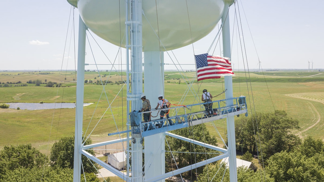 Maguire Iron working on a water tank A photo of Maguire Iron workers inspecting a water tank