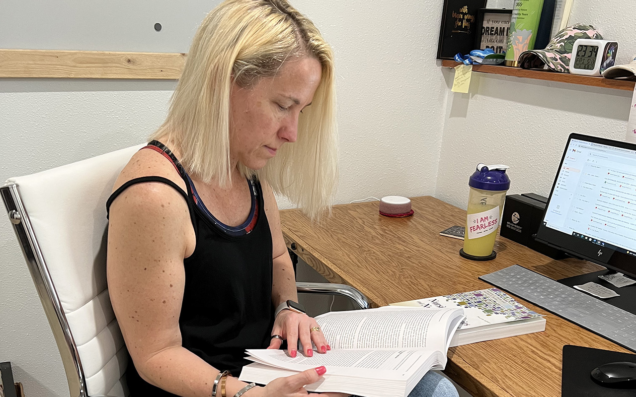 Erica Larson studies Erica Larson Hero Image