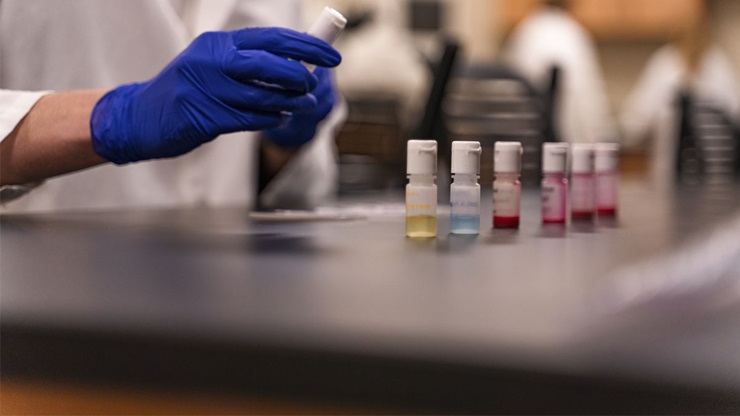 The USD MLS Lab, vials are being filled The USD MLS Lab, vials are being filled