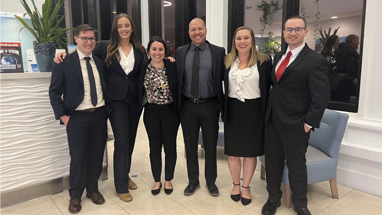 Six of USD's trial team members stand together in the photo Six of USD's trial team members stand together in the photo