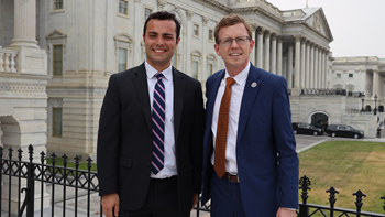 Charles Streeter stands with U.S. Rep. Dusty Johnson in front of the U.S. Capitol.