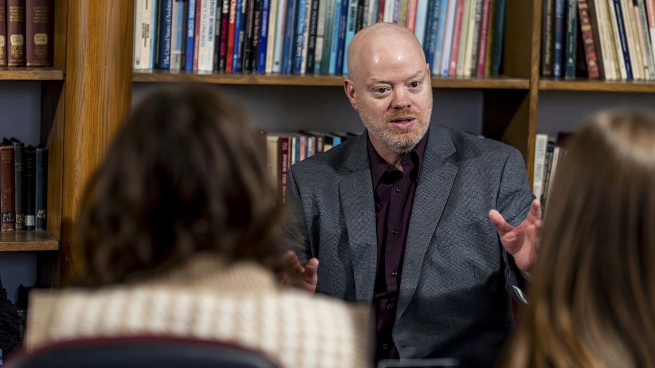 Skip Willman teaches to a group of students. He's talking enthusiastically with his hands. Skip Willman teaches to a group of students. He's talking enthusiastically with his hands.