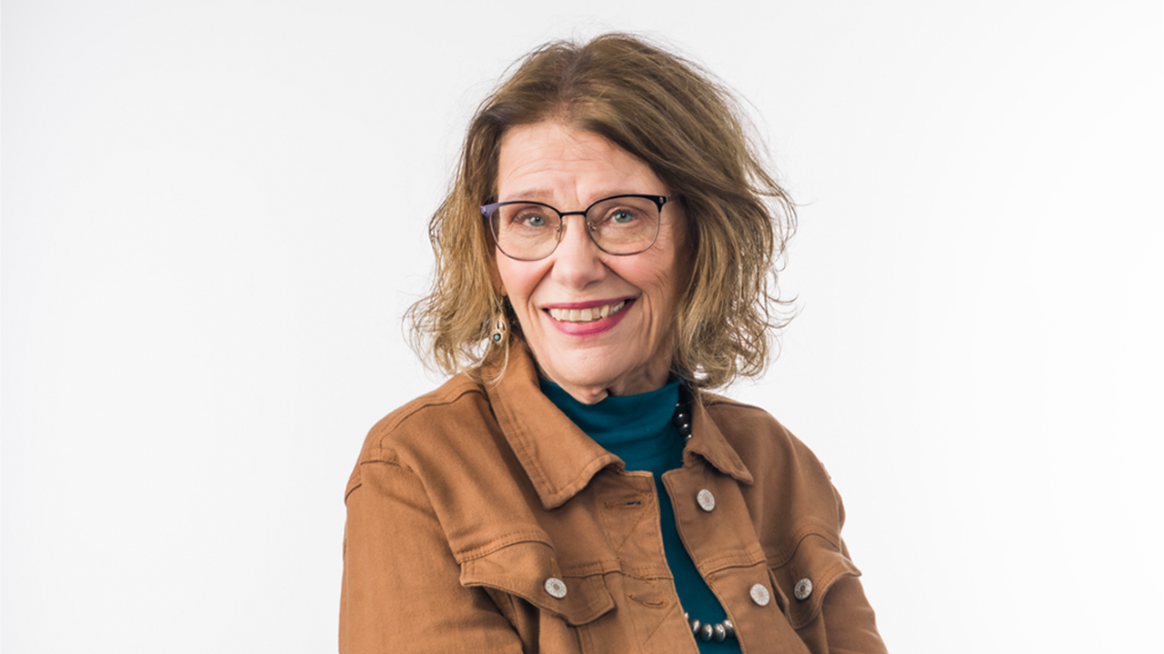 A headshot of Ann Robertson.