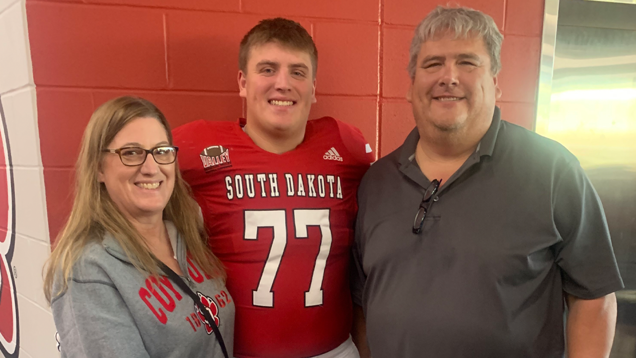 Cliff Johnson and his parents Susan and Cliff Johnson Jr.