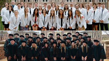 Physical therapy graduate students pose for picture in front of Old Main