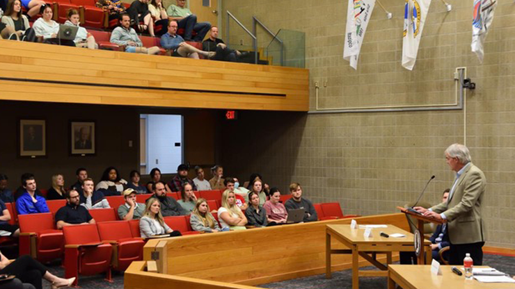 Students at the University of South Dakota Knudson School of Law engrossed in a captivating lecture by a distinguished speaker