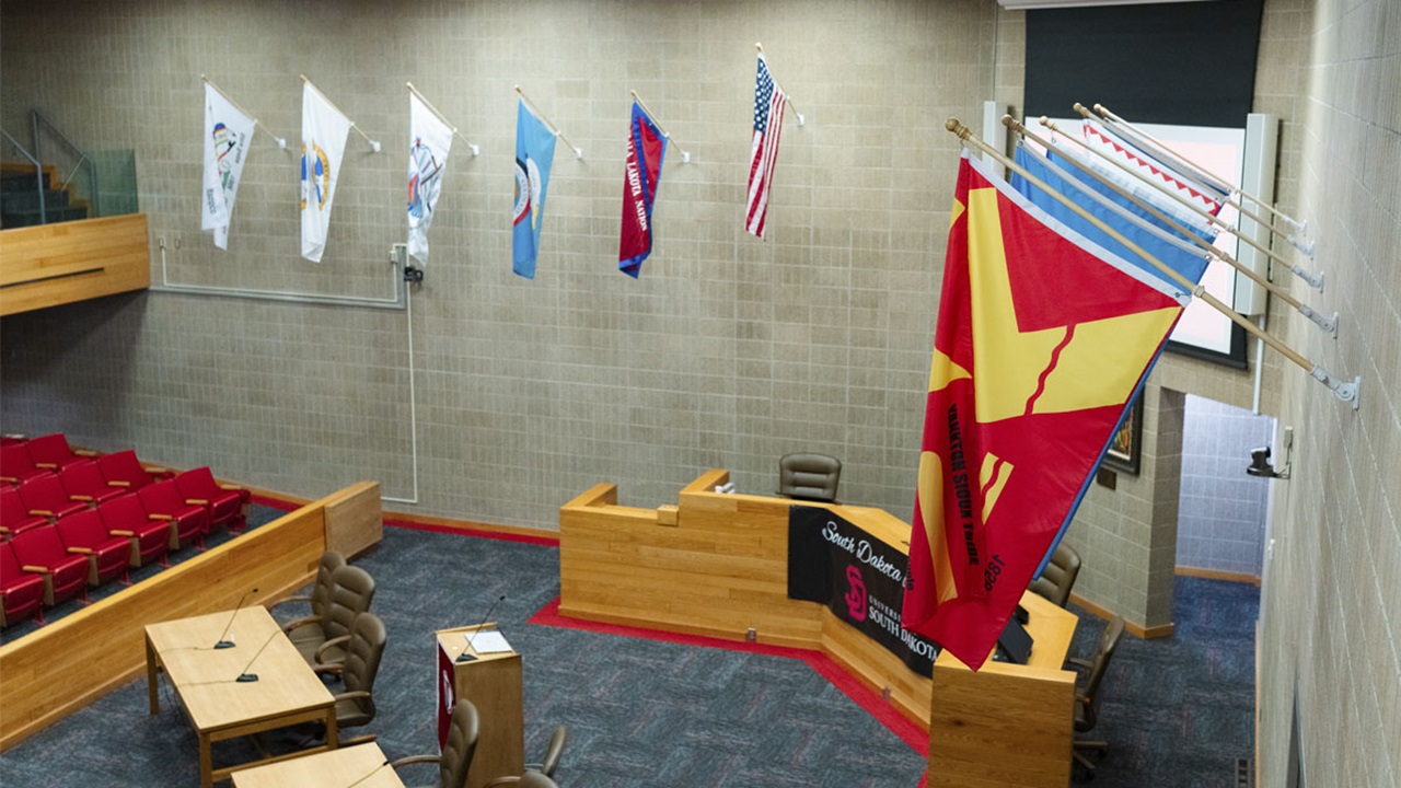 The nine tribal flags of South Dakota are seen hanging in the USD Knudson School of Law courtroom The nine tribal flags of South Dakota are seen hanging in the USD Knudson School of Law courtroom
