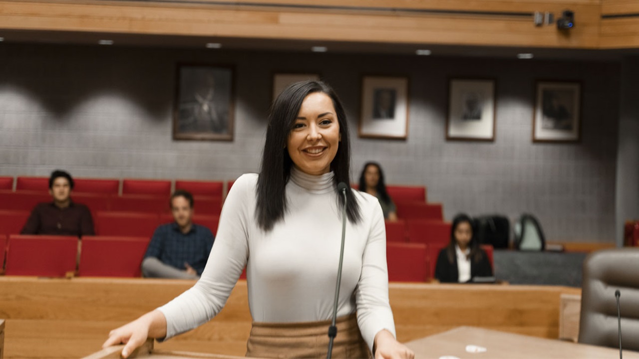 A law student stands at a podium in the Knudson School of Law courtroom, practicing for an argument. A law student stands at a podium in the Knudson School of Law courtroom, practicing for an argument.