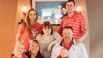 Inès White and her family. Standing, left to right, is oldest daughter, Allie Riddle, daughter Katie and son Sam. Seated, from left to right are Allie’s daughter, Emma, Inès, Allie’s son, Wyatt and Inès’ husband, Chris.