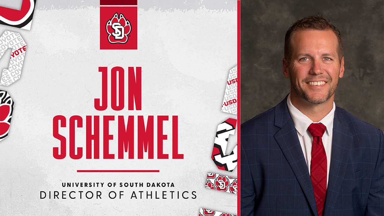Jon Schemmel’s headshot. He smiles at the camera wearing a red tie and blue pinstripe suit. Jon Schemmel’s headshot. He smiles at the camera wearing a red tie and blue pinstripe suit.
