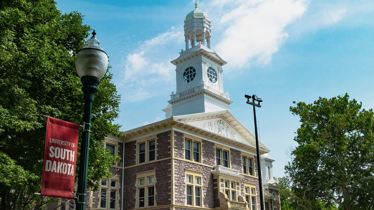 Old Main is featured in this photo on a bright blue summer day. Old Main is featured in this photo on a bright blue summer day.
