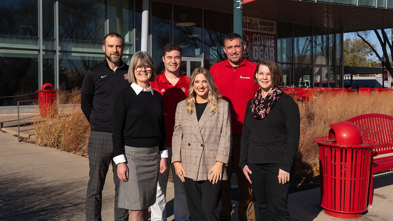 The staff from the Center for Career & Life Design pose for a group photo with the MUC in the background.