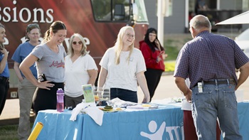 Center for the Prevention of Child Maltreatment staff at an event for WIC. Center for the Prevention of Child Maltreatment staff at an event for WIC.