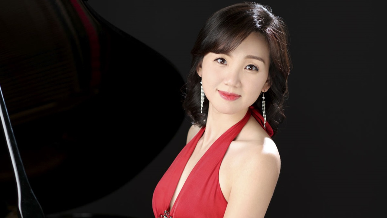 Eun-Hee Park smiles at the camera. Eun-Hee Park smiles at the camera.