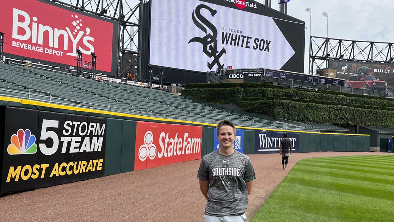Aaron Trunt wearing a Chicago White Sox jersey on the White Sox field. Aaron Trunt wearing a Chicago White Sox jersey on the White Sox field.