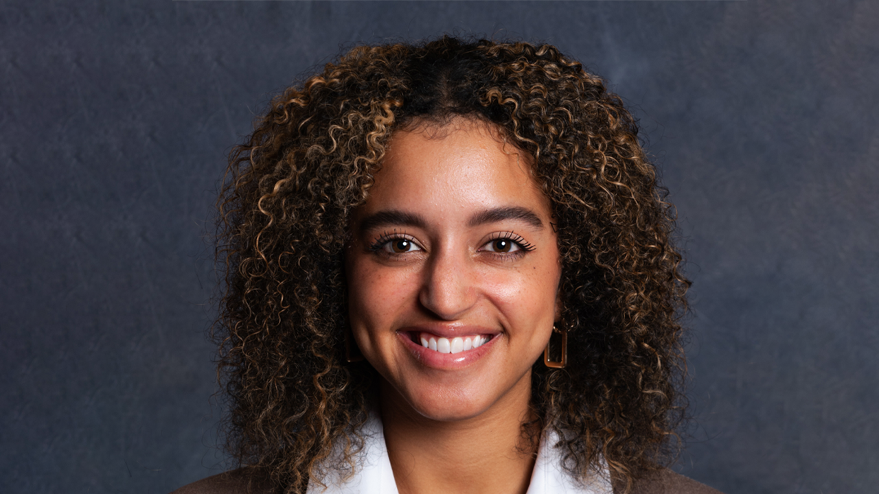 A headshot of AJ Jackson.