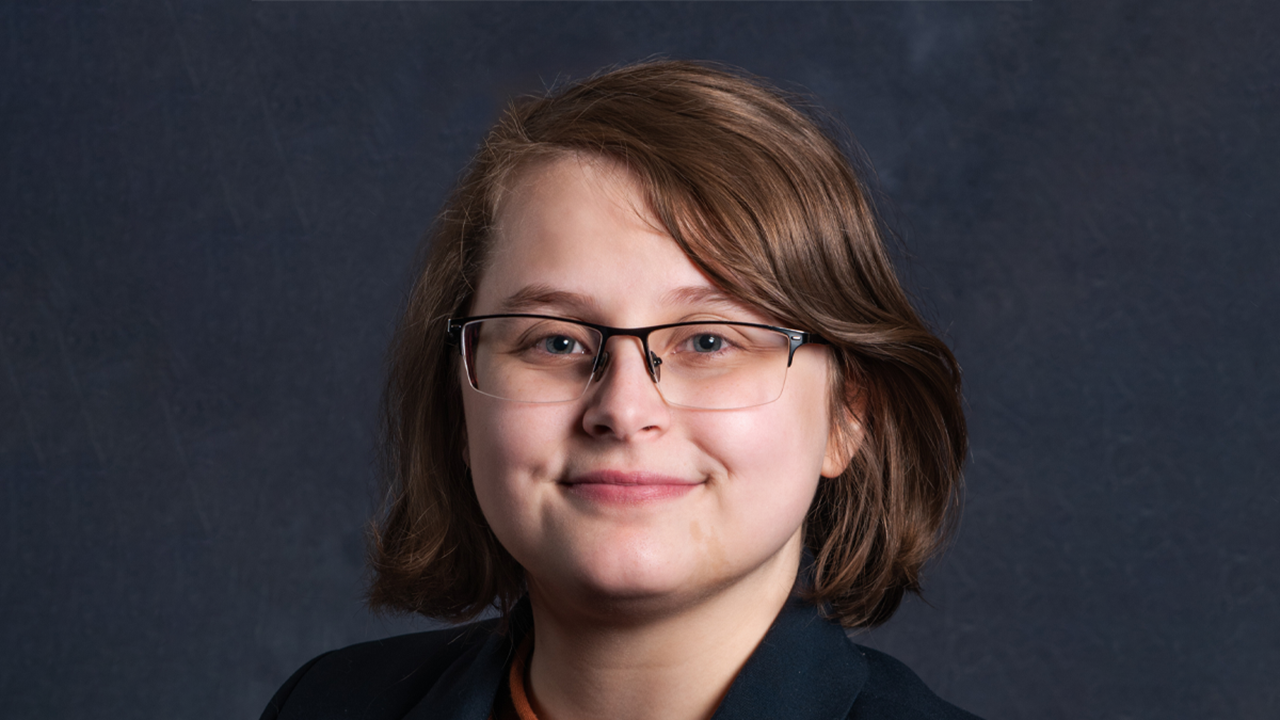 A headshot of Isabella Erickson.