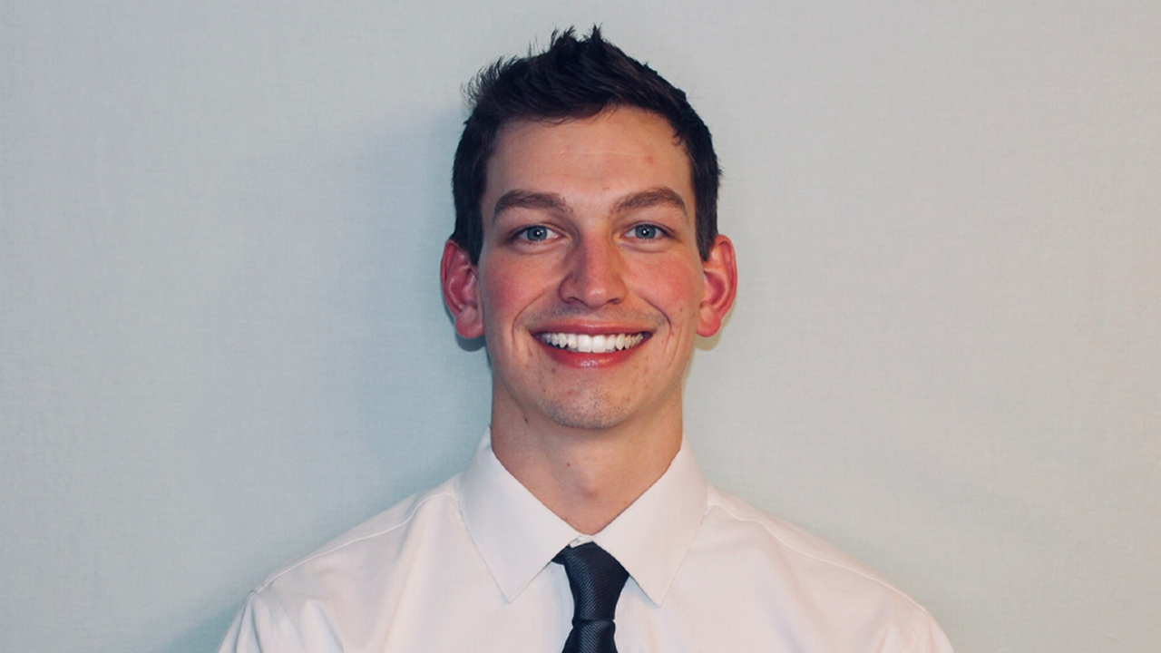 A headshot of Justin Larson.