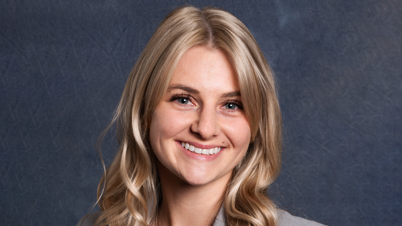 A headshot of Emma Thomas.