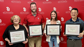 The University of South Dakota School of Education honored four faculty members – Emma Johnson, Ph.D.; Hyung Suk Yang, Ph.D.; Monica Iverson, Ed.D. '10, M.A. '98; and John Williams, Ed.D. '22 – with Faculty Excellence Awards.