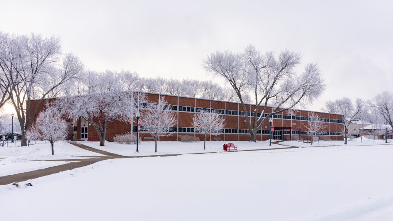 The Delzel Education Center sits on a wintry USD campus.