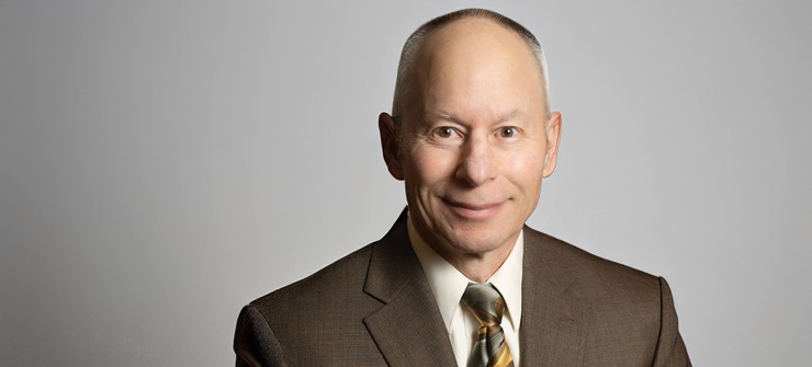 Dr. Matthew Simmons poses for his headshot photo.