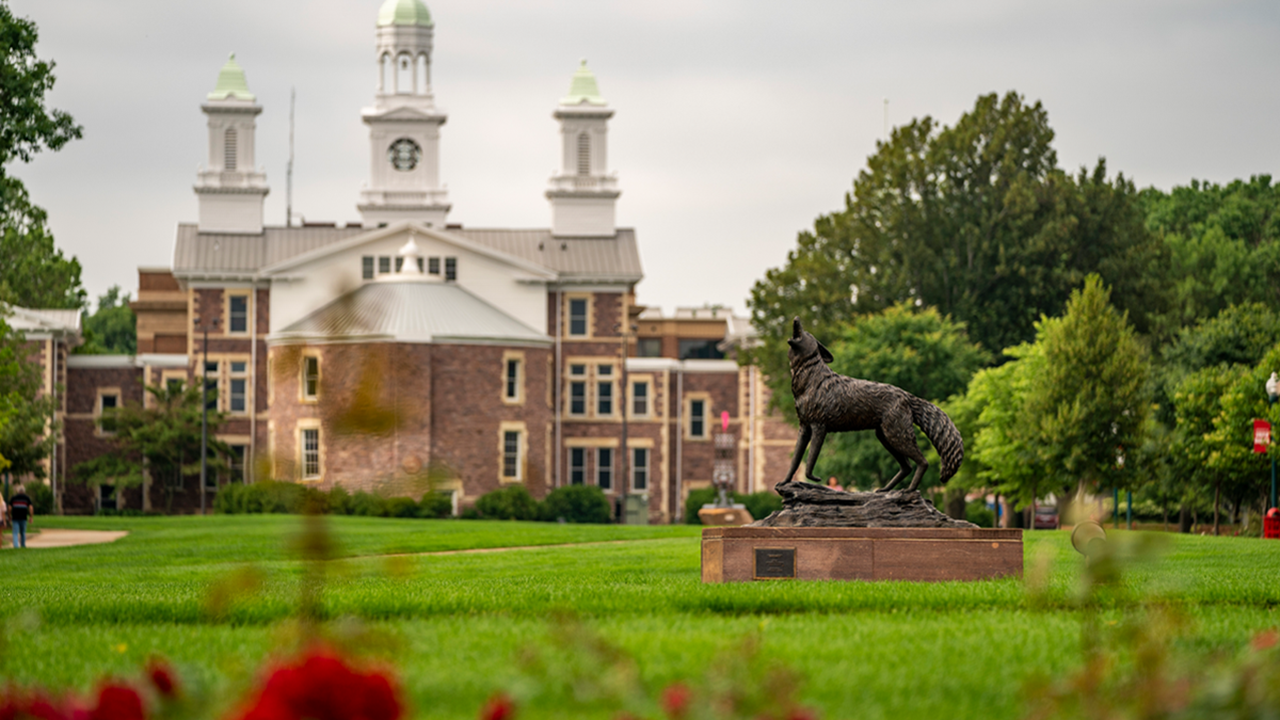 The Legacy statue sits in front of Old Main on the USD campus.