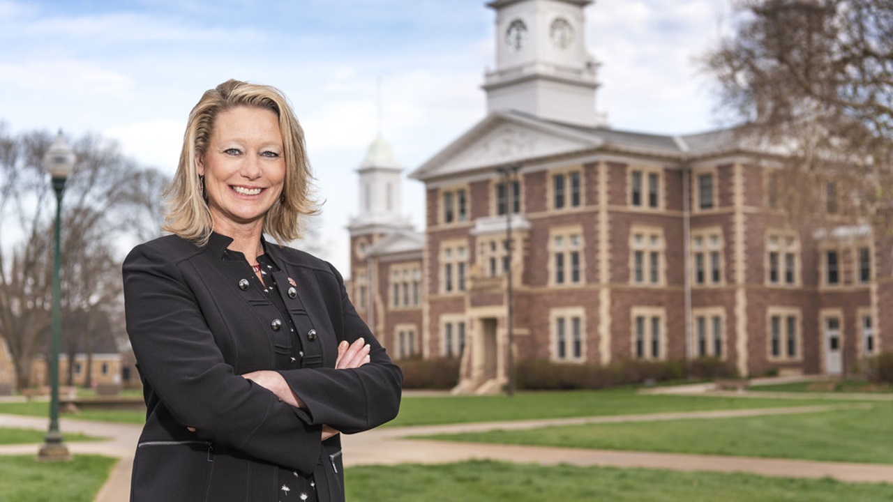USD President Sheila K. Gestring standing by Old Main with her arms crossed. USD President Sheila K. Gestring standing by Old Main with her arms crossed.