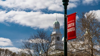 USD banner in front of old main
