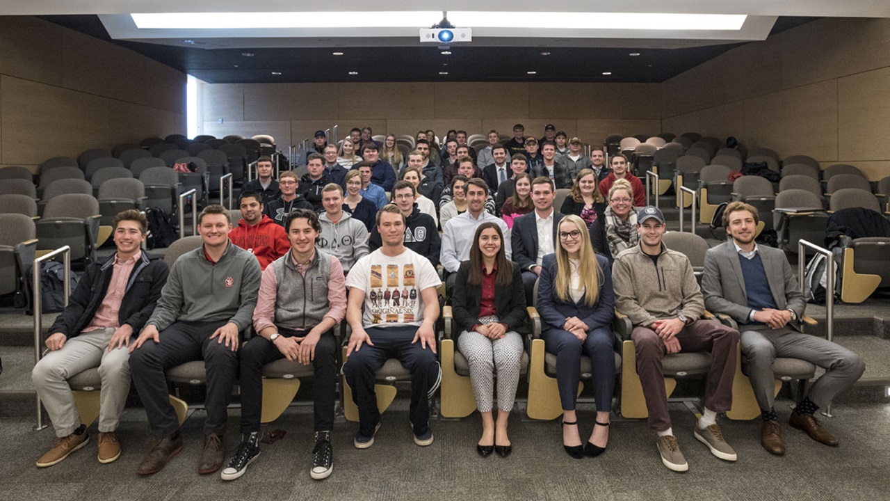 The group of Coyote Capital Management students sitting together. The group of Coyote Capital Management students sitting together.