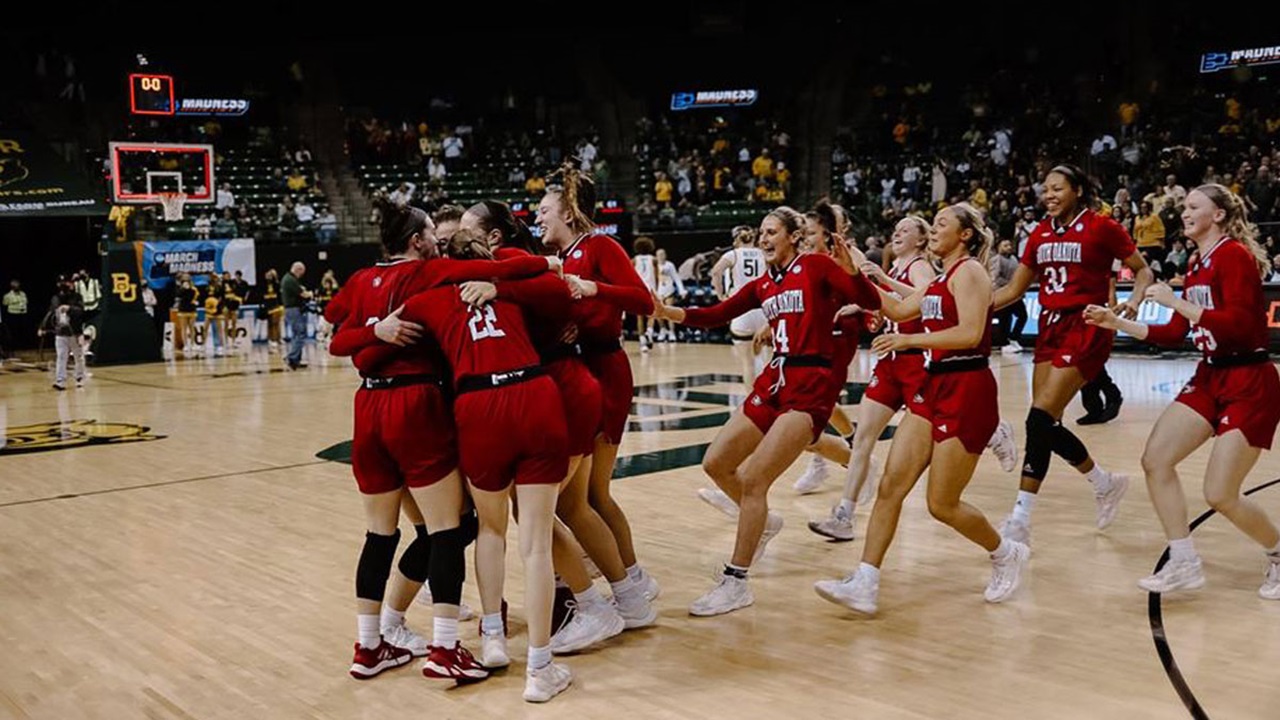 The USD women's basketball team celebrates after its win against Baylor in the second round of the NCAA Tournament. The USD women's basketball team celebrates after its win against Baylor in the second round of the NCAA Tournament.