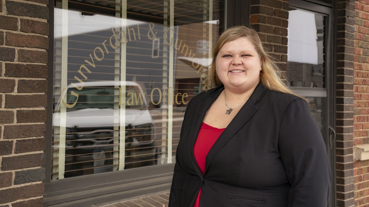 Rachelle Norberg standing in front of her small-town law office in Burke, South Dakota. Rachelle Norberg standing in front of her small-town law office in Burke, South Dakota.
