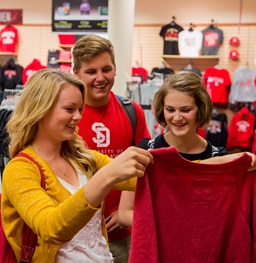 Students shopping at Charlie's bookstore.