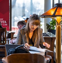 A Law student studying in the Law library.