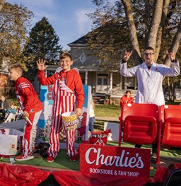 Children waving on a Dakota Days parade float.