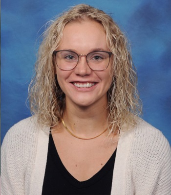 Success story Bradie Timmins smiling.