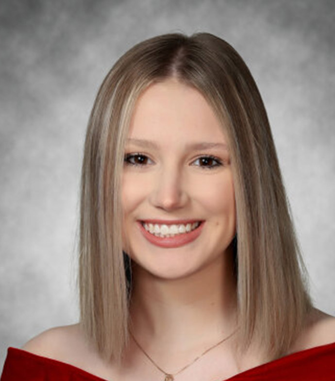 Success story Callie Olson smiling.