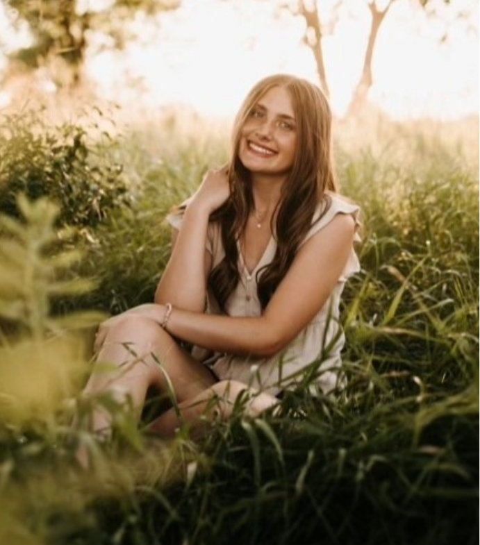 Chloe Schneider smiling.