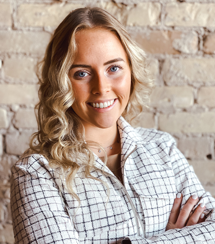 Success story Kali Driscoll smiling.