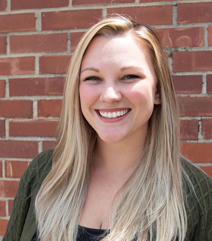 Success story Nicole Decker smiling.