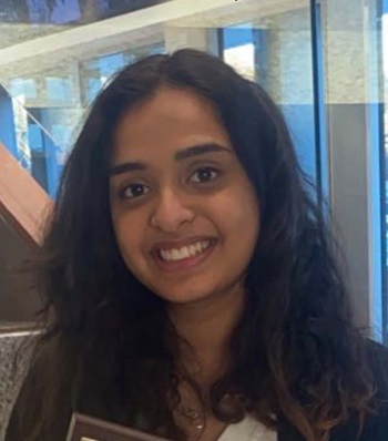 Success story Pooja Modawel smiling.