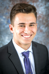 A headshot of Max Boecker.