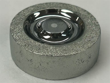 This photo shows a round, circular device that is the product of an advanced radiation detector.