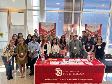 Jarchow takes a photo with the Department of Sustainability & Environment group.