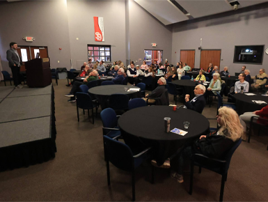 A USD student presents at the annual Democracy Conference.