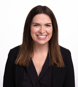 Jessica Messersmith, Ph.D., looks toward the camera and smiles for her professional photo.